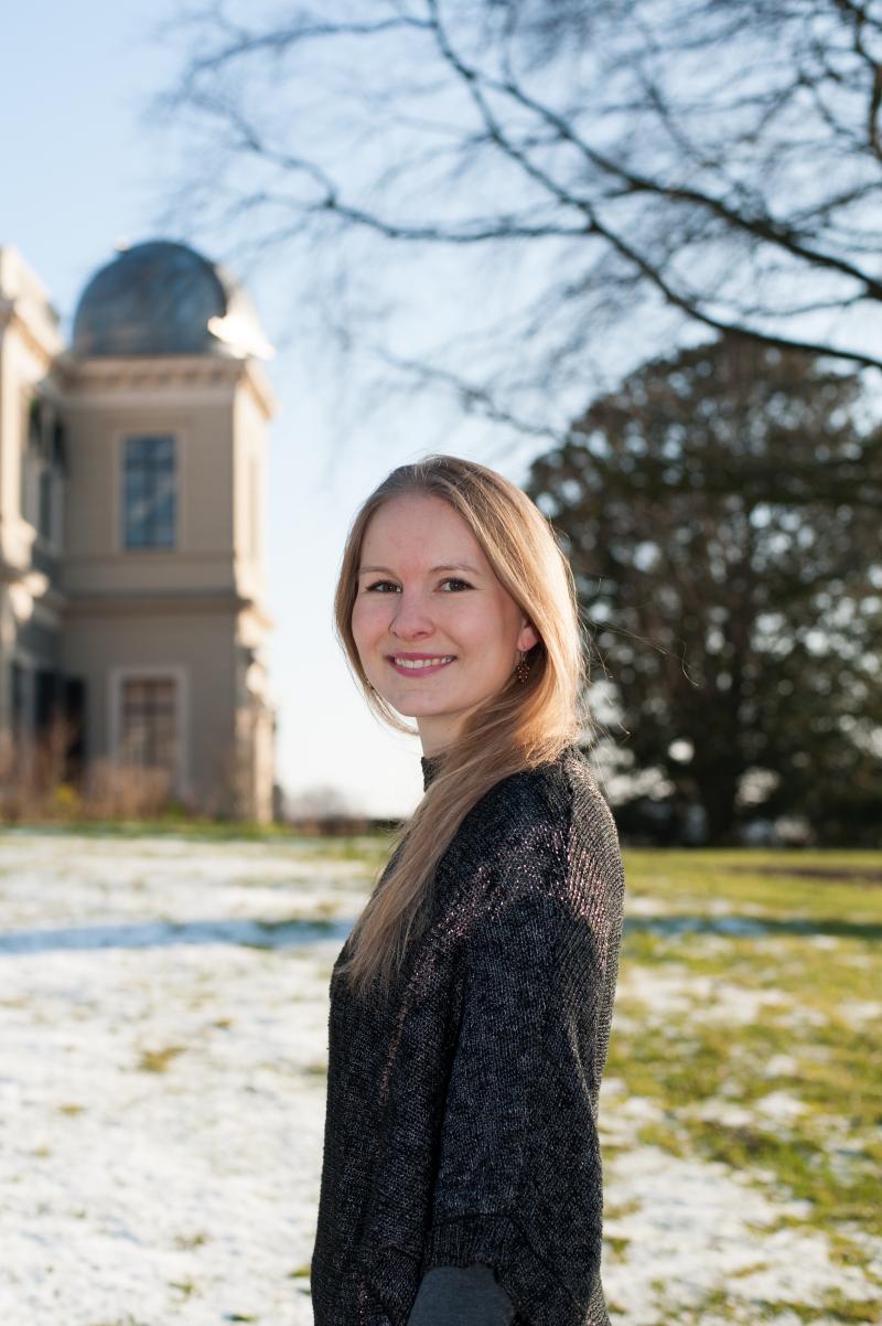 Portrait outdoors in front of an observatory building